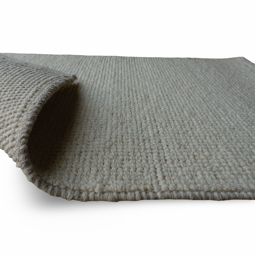 White Flat Weave Rug With Unique Texture On The Surface