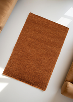 Orange Flat Weave Rug With Unique Texture On The Surface