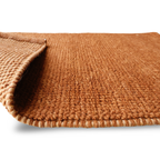 Orange Flat Weave Rug With Unique Texture On The Surface