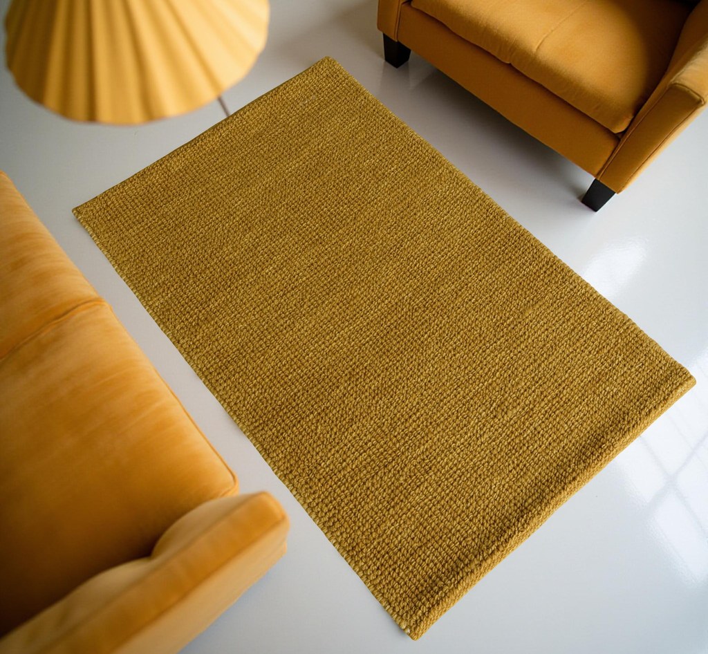 Gold Flat Weave Rug With Unique Texture On The Surface